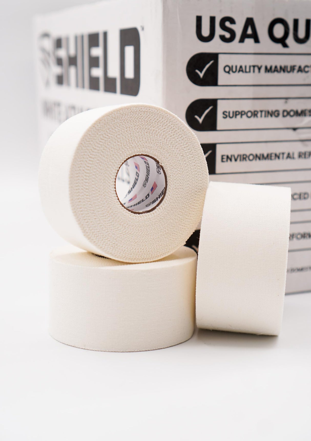 SHIELD | 32 Pack White Athletic Tape Bulk- 1.5 Inches x 15 Yards - Made in USA Easy Tear, Rigid, No Residue. Sports Medicine - Athletes, Medical, Therapy, Athletic Trainers: Ankles Wrists Fingers