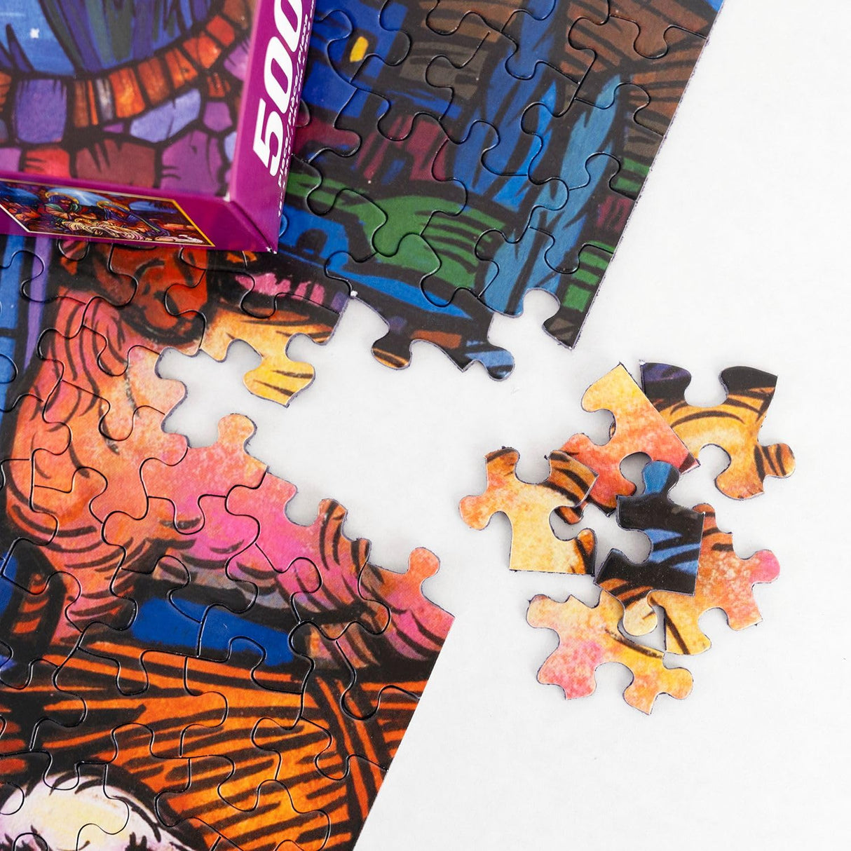 Springbok's Stained Glass Nativity 500 Piece Jigsaw Puzzle Features a Mosaic Interpretation of The Nativity by Artist Lew Johnson