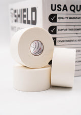 SHIELD | 32 Pack White Athletic Tape Bulk- 1.5 Inches x 15 Yards - Made in USA Easy Tear, Rigid, No Residue. Sports Medicine - Athletes, Medical, Therapy, Athletic Trainers: Ankles Wrists Fingers