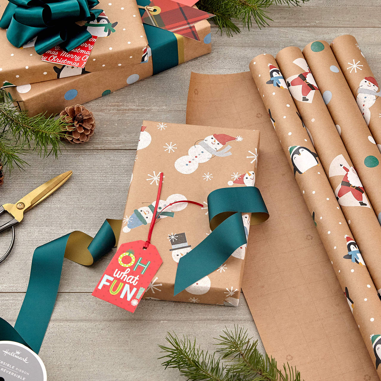 Hallmark Kraft Christmas Wrapping Paper for Kids with Cut Lines on Reverse (4 Rolls: 88 sq. ft. ttl) Penguins, Santa, Snowmen, Polka Dots